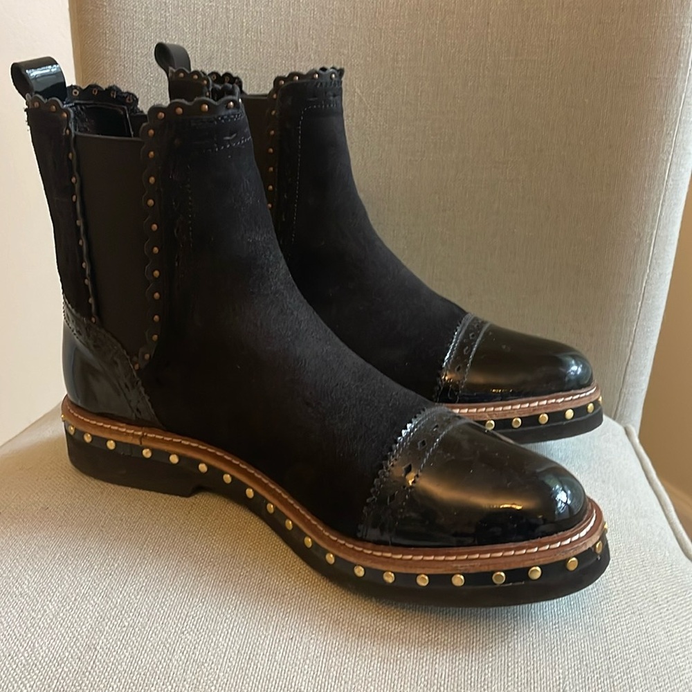 Free People suede and patent leather boots.